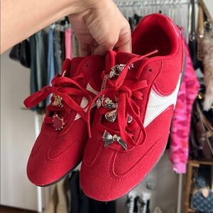 Women’s red charm sneakers